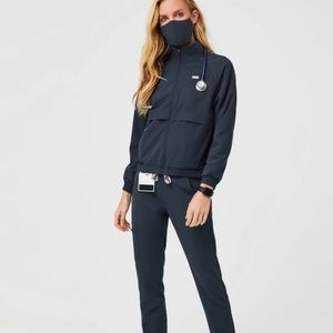 Wear figs the performance jacket in dark harbor